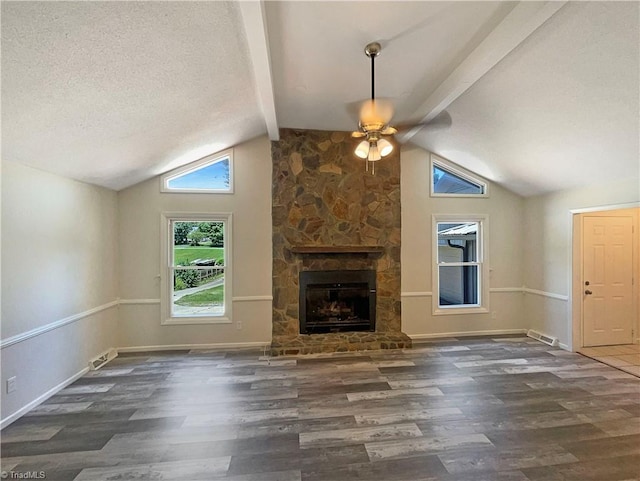 6630 Riverwood Rd, Walkertown, NC 27051 - unfurnished living room featuring wood finished floors, healthy amount of natural light, ceiling fan, and a textured ceiling