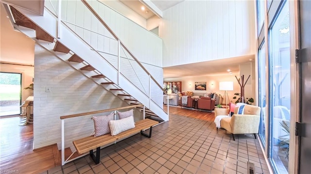 3307 Gaston Rd, Greensboro, NC 27407 - stairs featuring a high ceiling and wood finished floors