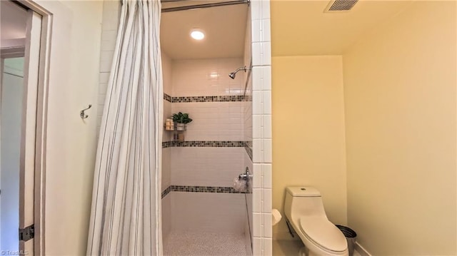 3307 Gaston Rd, Greensboro, NC 27407 - bathroom with a stall shower, toilet, and recessed lighting