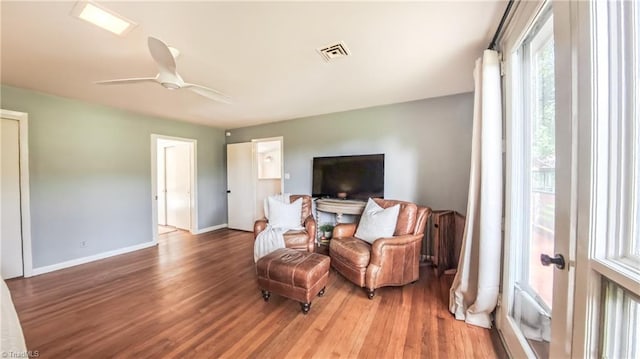 3307 Gaston Rd, Greensboro, NC 27407 - living area featuring wood finished floors, baseboards, and a ceiling fan