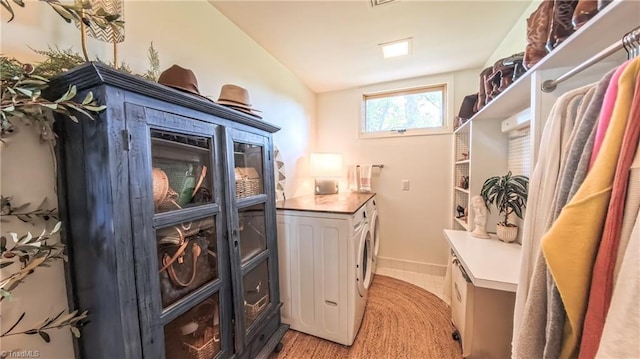 3307 Gaston Rd, Greensboro, NC 27407 - laundry room with washer and clothes dryer and baseboards