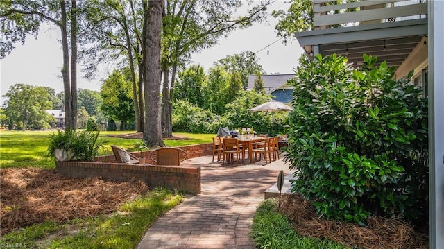 3307 Gaston Rd, Greensboro, NC 27407 - view of home's community with a patio area and outdoor dining area