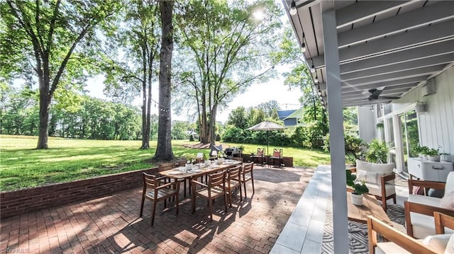 3307 Gaston Rd, Greensboro, NC 27407 - view of patio featuring outdoor dining space and a ceiling fan