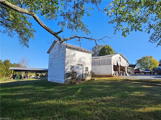 view of home's exterior featuring a lawn