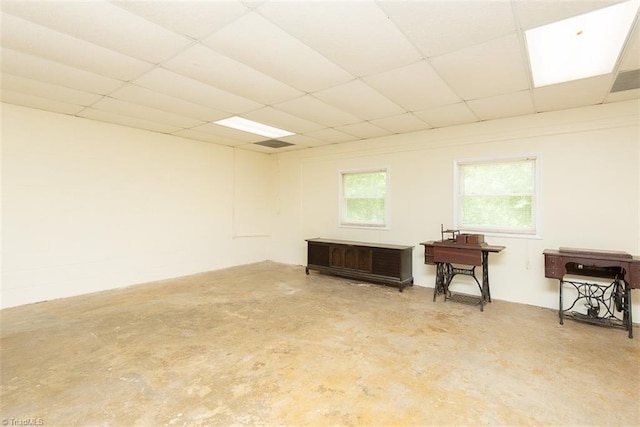 interior space featuring a paneled ceiling