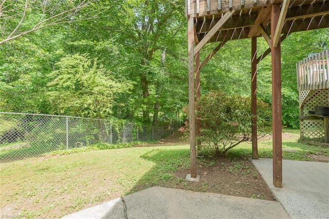 view of yard featuring fence and a patio area