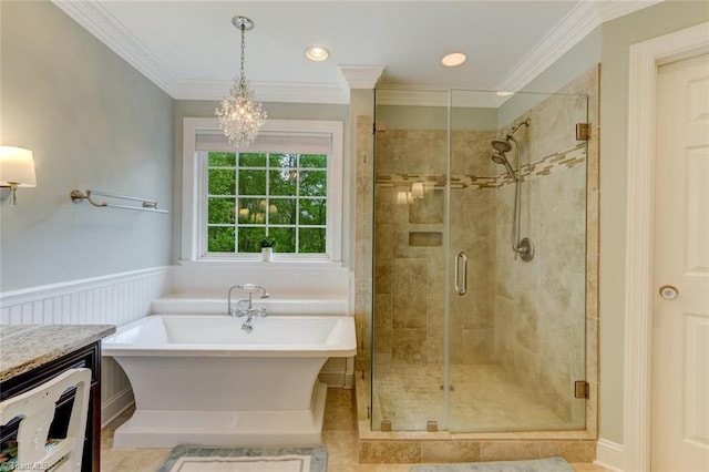 full bathroom with crown molding, an inviting chandelier, a freestanding bath, and a shower stall