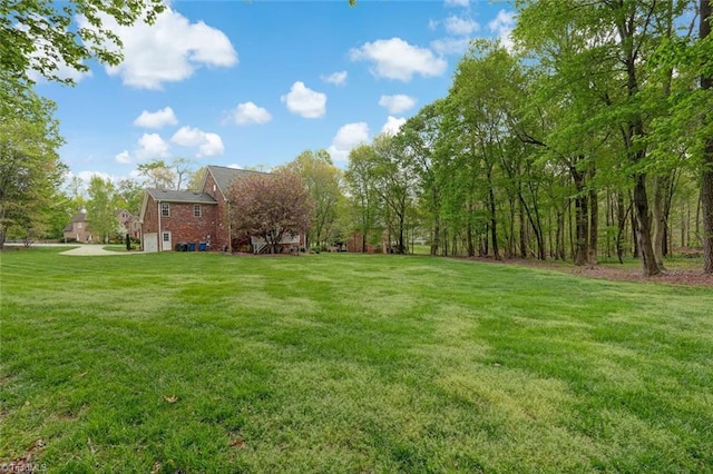 view of yard with a garage