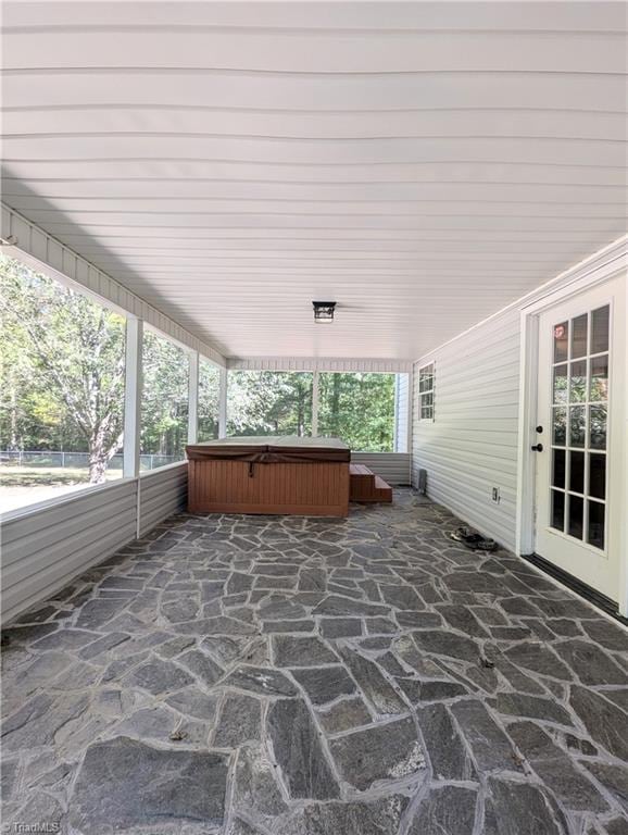 view of patio with a hot tub