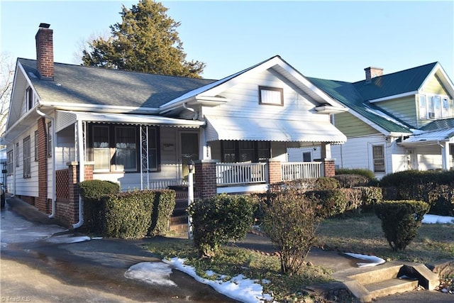 view of front of home featuring covered porch