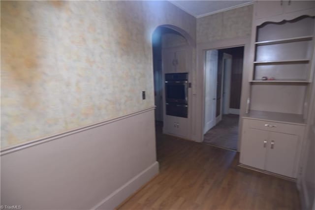 corridor featuring dark hardwood / wood-style flooring