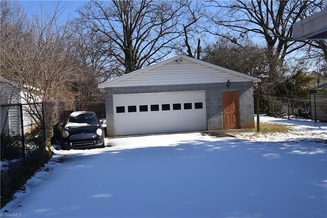 view of snow covered garage