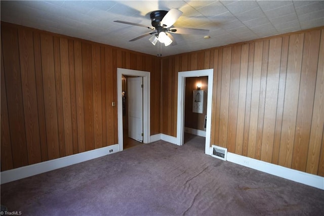 carpeted empty room with ceiling fan