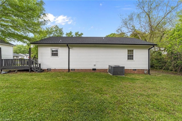 back of house featuring a lawn, a wooden deck, crawl space, and cooling unit