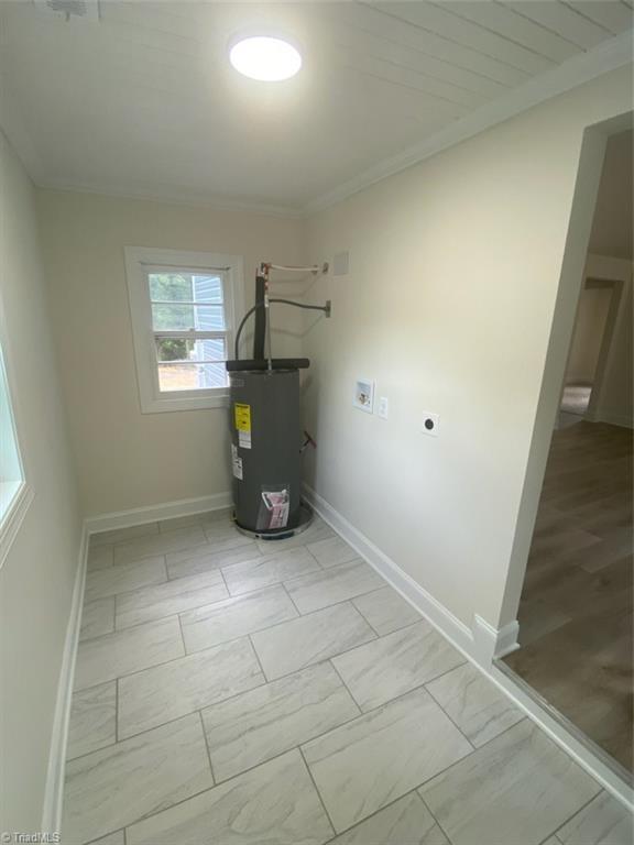 820 Broad Ave, Greensboro, NC 27406 - utility room with electric water heater