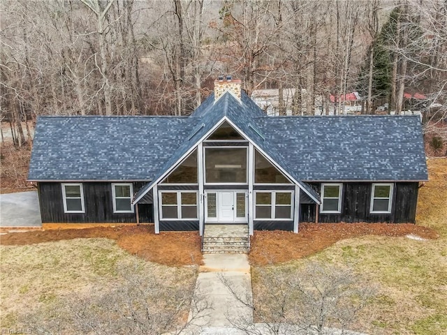 view of front of property featuring a chimney