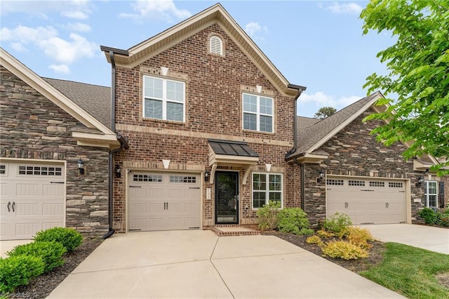 view of front of property featuring a garage