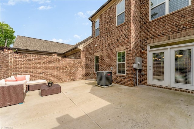 view of patio featuring an outdoor living space and central AC unit