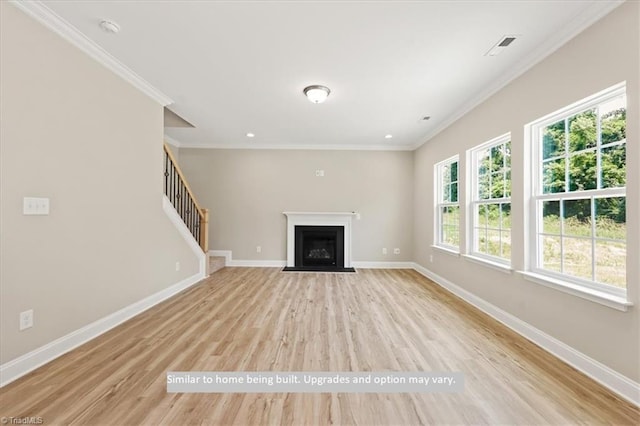 4099 Stallion St Lot 18, High Point, NC 27262 - unfurnished living room with wood finished floors, baseboards, a fireplace with flush hearth, ornamental molding, and recessed lighting