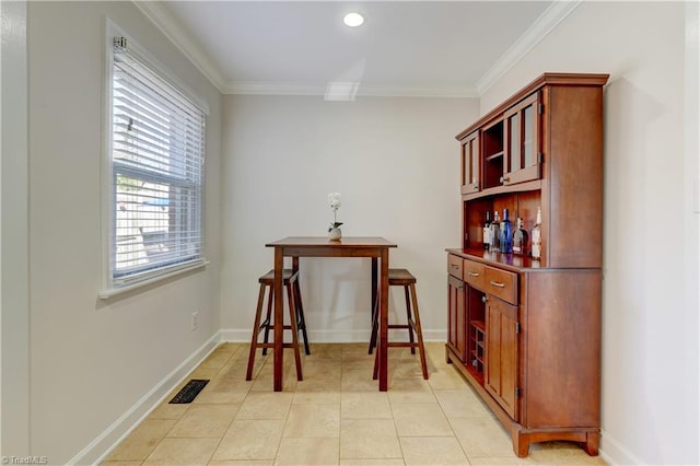 interior space featuring crown molding