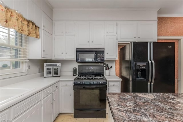 kitchen with crown molding, white cabinetry, and black appliances