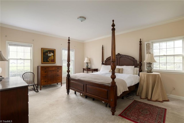 carpeted bedroom featuring crown molding