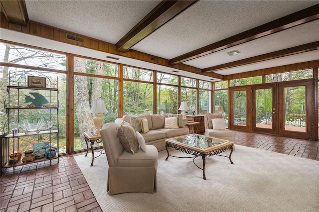 sunroom / solarium with beam ceiling