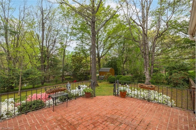 view of terrace featuring an outdoor structure