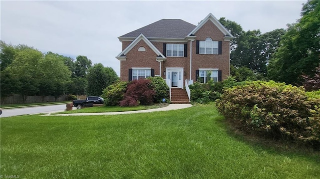 1020 Clyde Edgerton Dr, Kernersville, NC 27284 - view of front of property with a front lawn and brick siding
