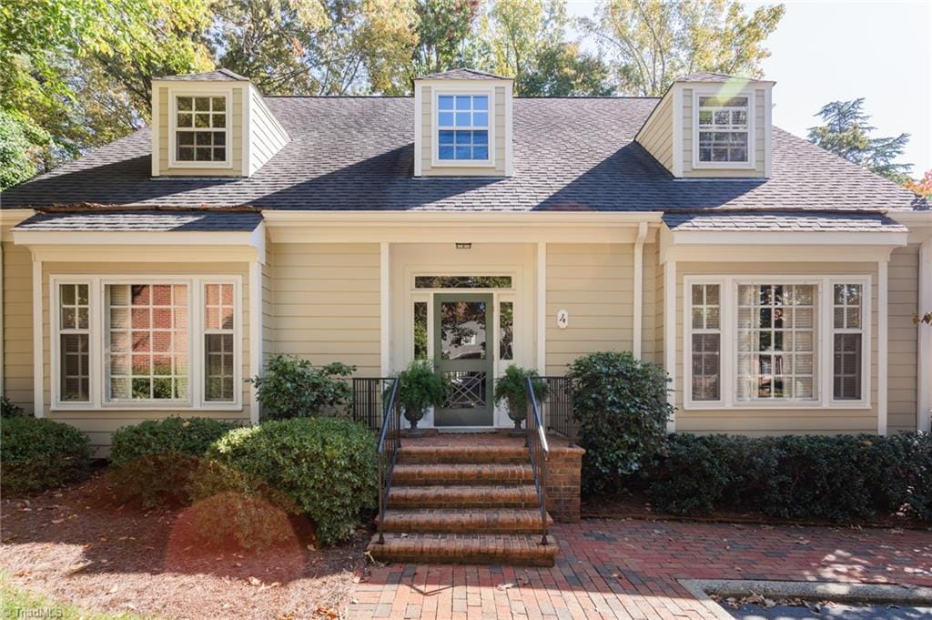 view of new england style home