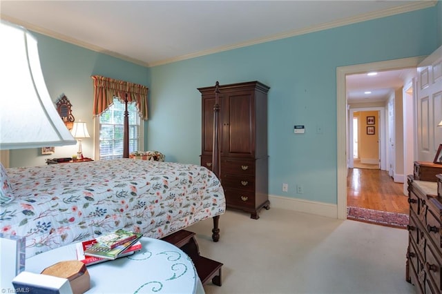 carpeted bedroom with crown molding