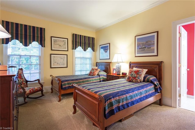 bedroom featuring carpet flooring, multiple windows, and ornamental molding