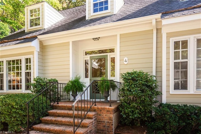 doorway to property with a porch