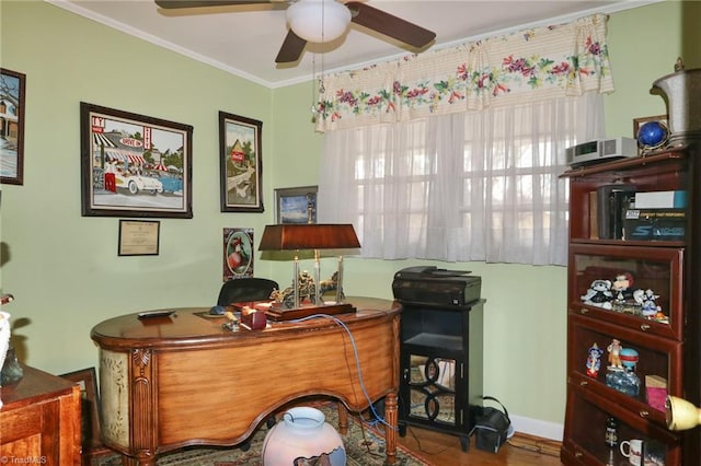 office with hardwood / wood-style floors, ornamental molding, and ceiling fan