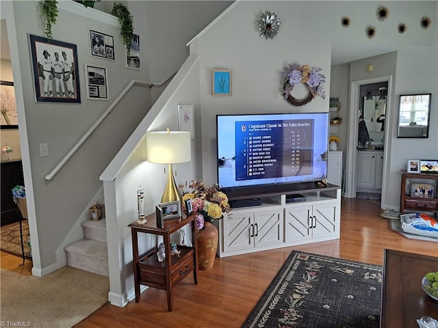 living room featuring light carpet