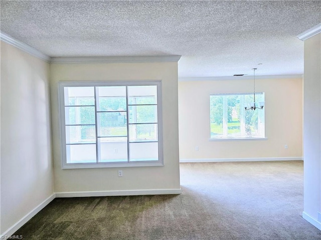 spare room featuring ornamental molding, carpet, and an inviting chandelier