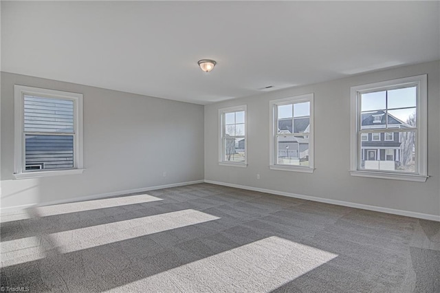 view of carpeted spare room