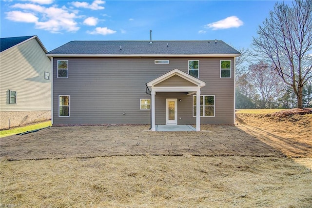 rear view of property with a patio area