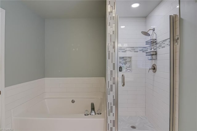 bathroom with independent shower and bath