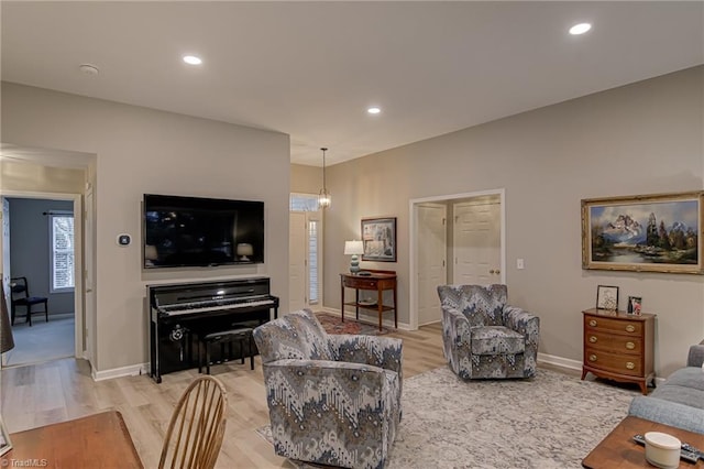 living room with light hardwood / wood-style floors