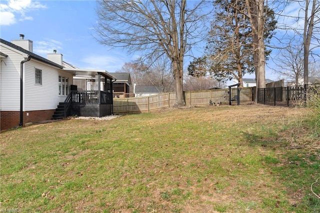 view of yard with a fenced backyard