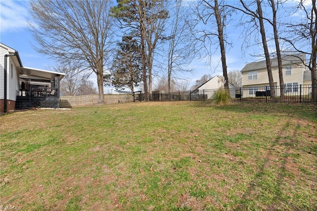 view of yard with fence