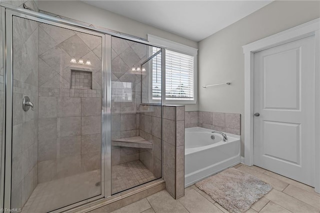 8018 Hacker Dr, Stokesdale, NC 27327 - full bath with a garden tub, a shower stall, and tile patterned floors