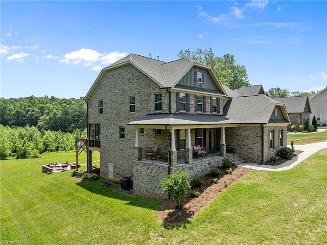 8018 Hacker Dr, Stokesdale, NC 27327 - view of side of property featuring a lawn, central AC unit, and brick siding