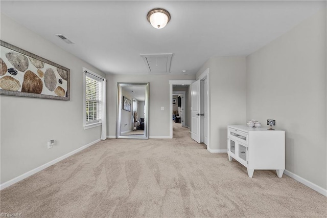 8018 Hacker Dr, Stokesdale, NC 27327 - unfurnished bedroom with attic access, light colored carpet, and baseboards