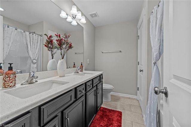8018 Hacker Dr, Stokesdale, NC 27327 - bathroom featuring double vanity, toilet, tile patterned flooring, baseboards, and a shower with shower curtain
