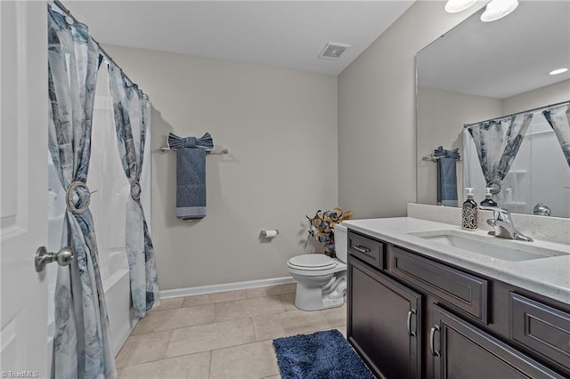 8018 Hacker Dr, Stokesdale, NC 27327 - bathroom featuring vanity, tile patterned flooring, toilet, shower / bathtub combination with curtain, and baseboards