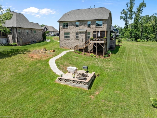 8018 Hacker Dr, Stokesdale, NC 27327 - rear view of house featuring stairs, a lawn, and a deck