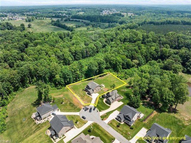 8018 Hacker Dr, Stokesdale, NC 27327 - aerial overview of property's location featuring a forest and property parcel outlined