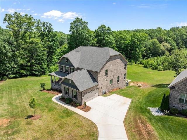 8018 Hacker Dr, Stokesdale, NC 27327 - aerial view of property and surrounding area featuring a heavily wooded area
